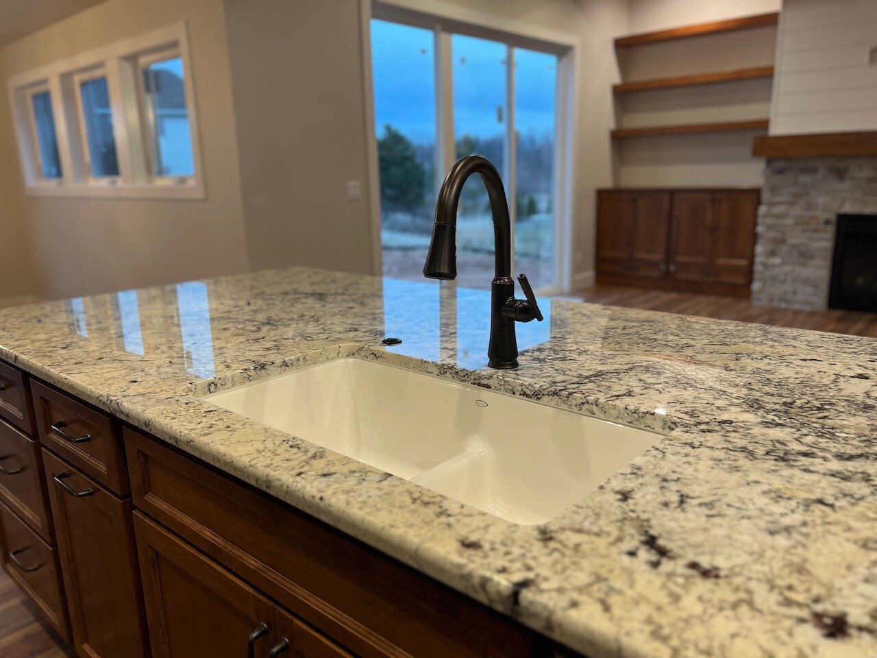 white sink with black faucet